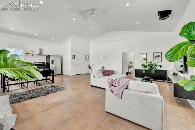 living room with ceiling fan and high vaulted ceiling