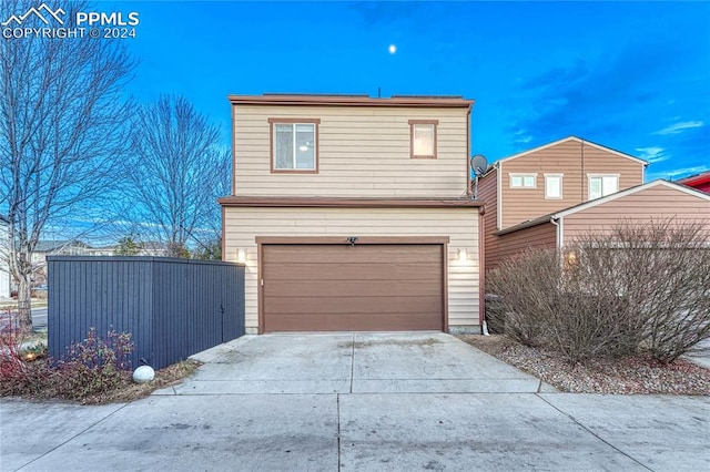 view of property featuring a garage