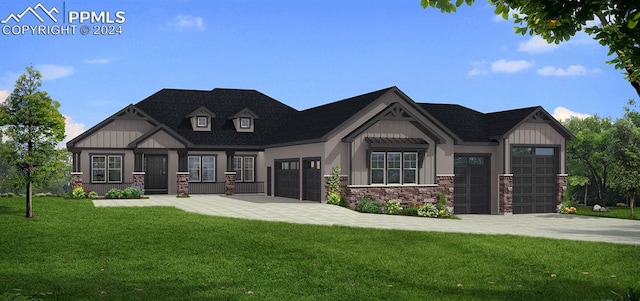 view of front of home featuring a garage and a front yard