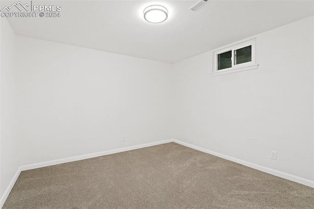 view of carpeted spare room