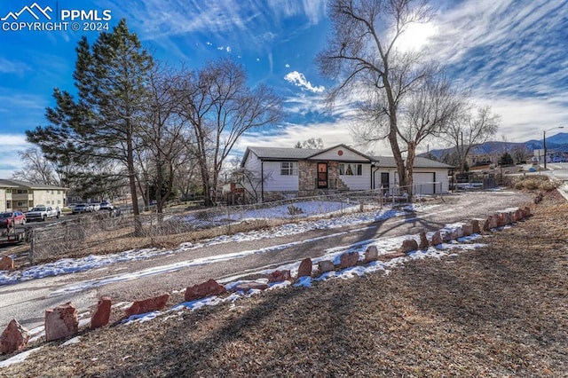 ranch-style house with a mountain view