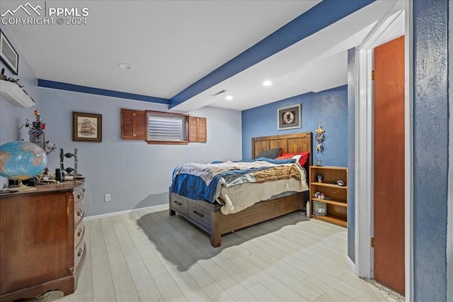 bedroom with light hardwood / wood-style flooring