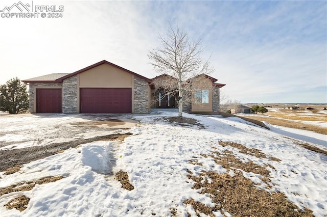 view of front of property with a garage