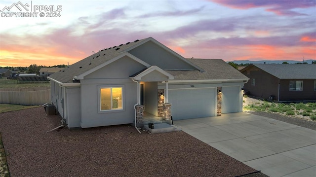 view of front of property with a garage