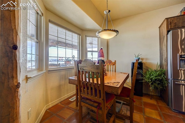 view of tiled dining space