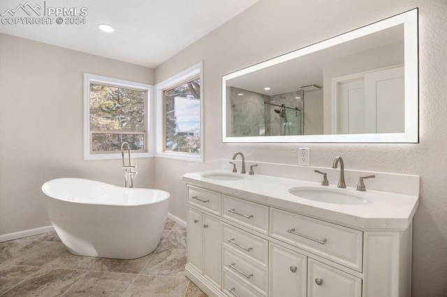 bathroom featuring separate shower and tub, tile patterned flooring, and vanity