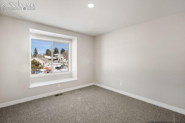 empty room with carpet floors