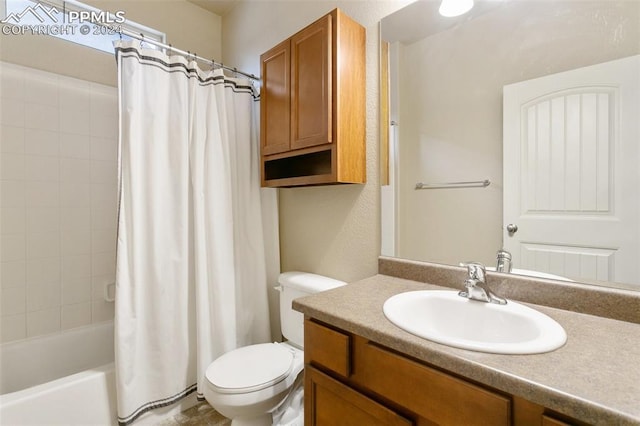 full bathroom featuring vanity, toilet, and shower / tub combo with curtain