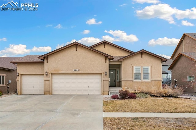 view of front of home featuring a garage