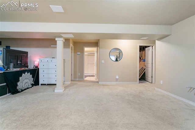 interior space featuring light colored carpet