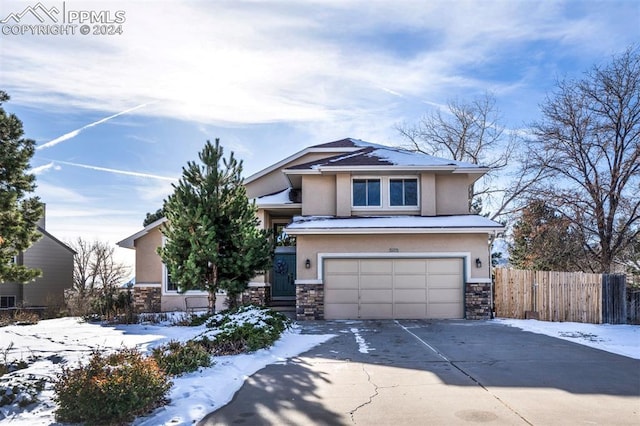 view of front of home with a garage