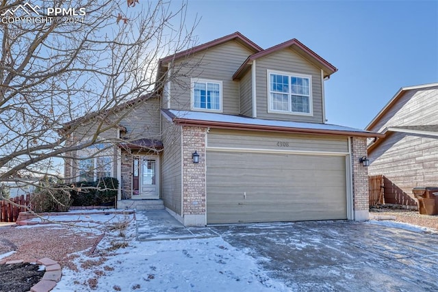 front of property featuring a garage