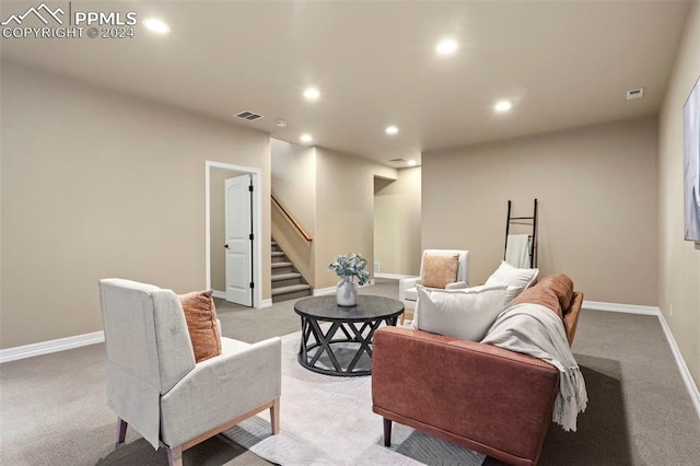 living room with light colored carpet