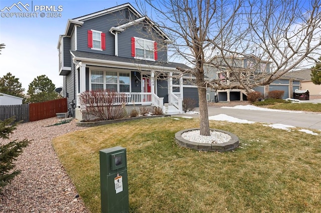 view of front of property with a front lawn and a porch