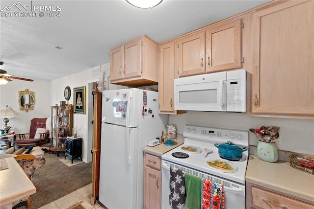 kitchen with ceiling fan, light brown cabinets, white appliances, and light tile patterned floors