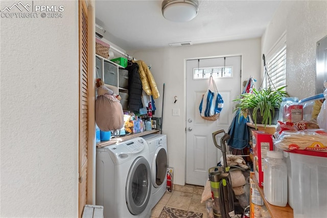 laundry room with independent washer and dryer