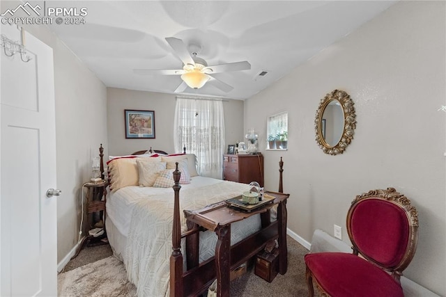 bedroom with light carpet and ceiling fan