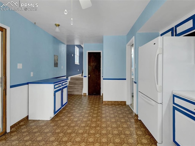 kitchen featuring white refrigerator