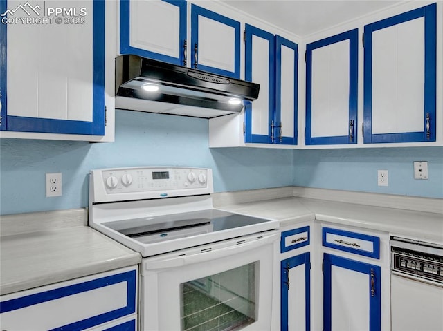 kitchen with white appliances, blue cabinets, and white cabinets