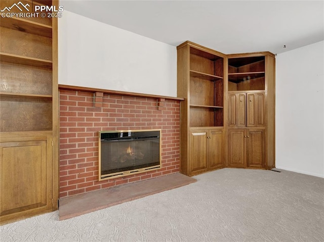 unfurnished living room featuring light colored carpet and a fireplace