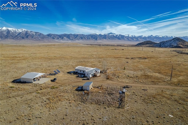 property view of mountains featuring a rural view