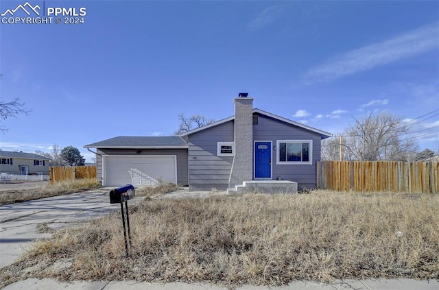 view of front of home with a garage