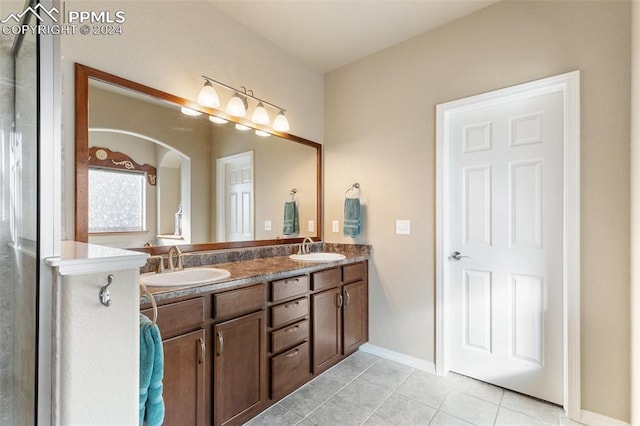 bathroom with vanity and tile patterned floors