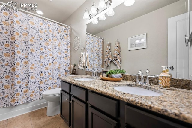 full bathroom featuring tile patterned flooring, vanity, toilet, and shower / bath combo