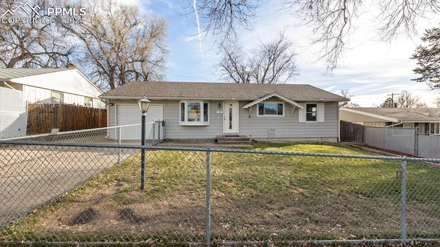 single story home featuring a garage and a front lawn