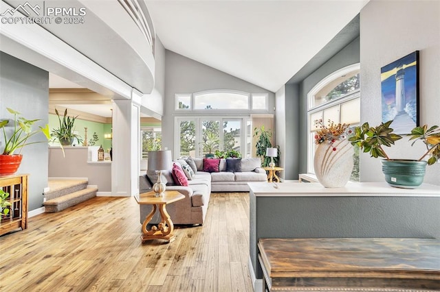 sunroom featuring lofted ceiling