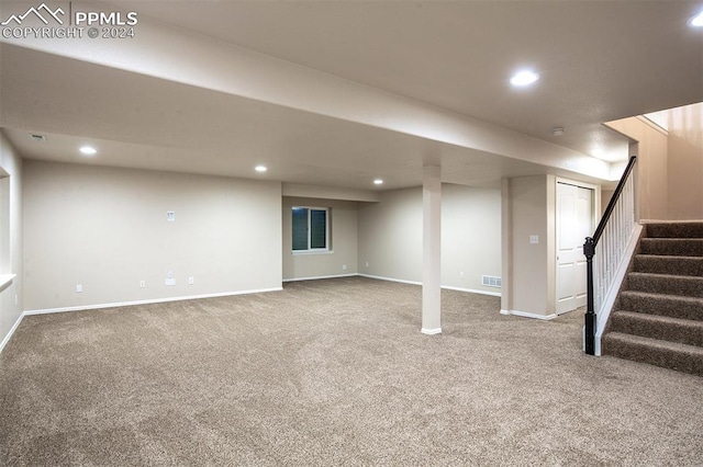 basement with carpet flooring