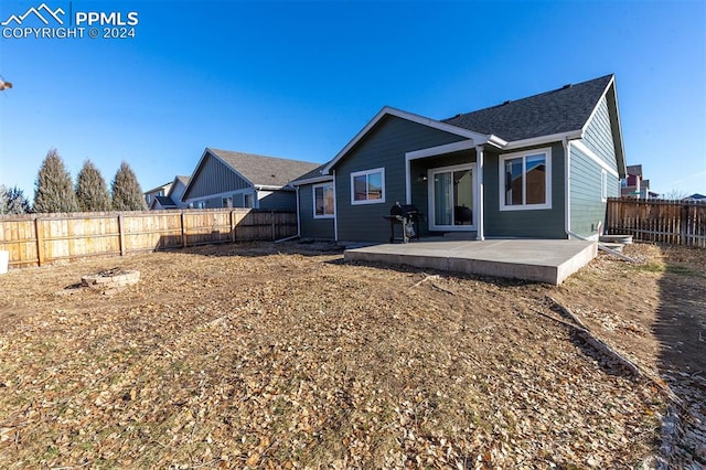 rear view of house featuring a patio area