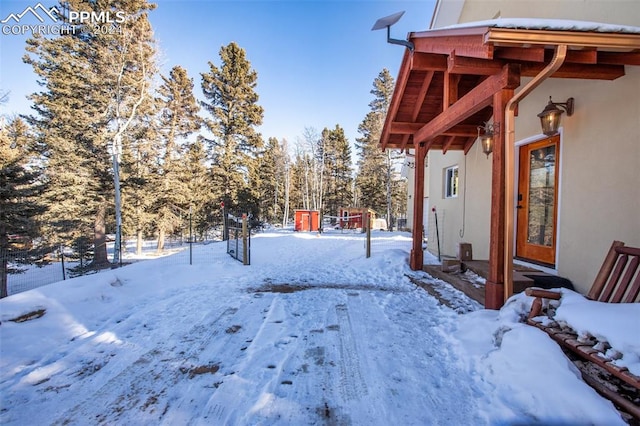 view of yard covered in snow