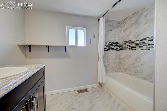 bathroom with vanity and shower / bath combo