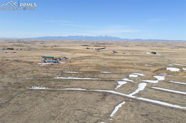 bird's eye view with a mountain view