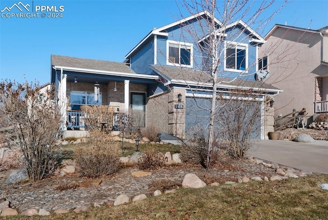 view of front of property featuring a garage