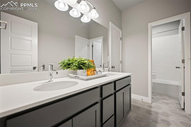 bathroom featuring vanity and shower / washtub combination