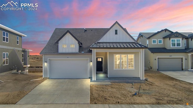 view of front of property with a garage