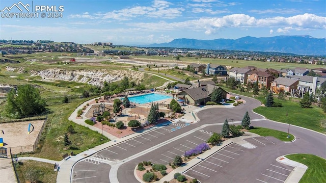 birds eye view of property featuring a mountain view