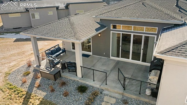 exterior space with an outdoor living space