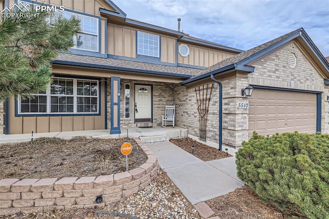 view of front of property with a garage