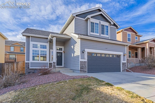 craftsman inspired home with a garage