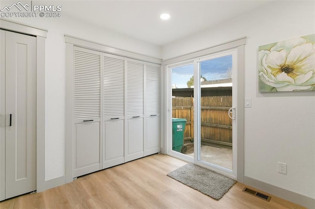 entryway with light wood-type flooring