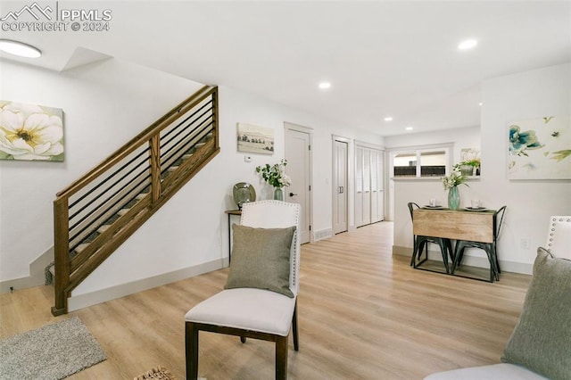 sitting room with light wood-type flooring