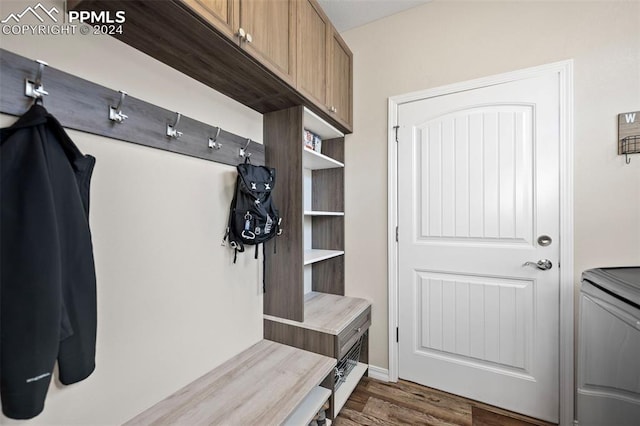 mudroom with dark hardwood / wood-style floors