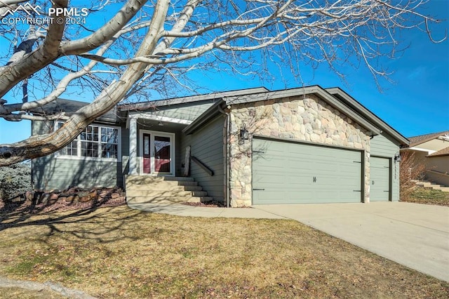 ranch-style home with a garage