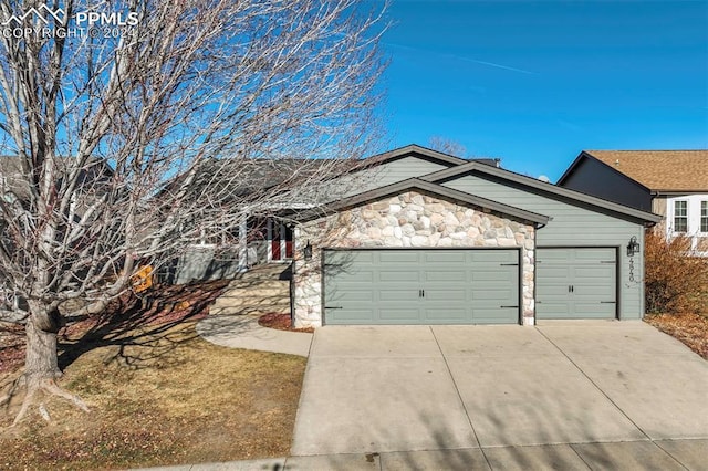 ranch-style home featuring a garage