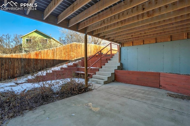 view of snow covered patio