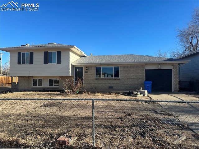 split level home with a garage