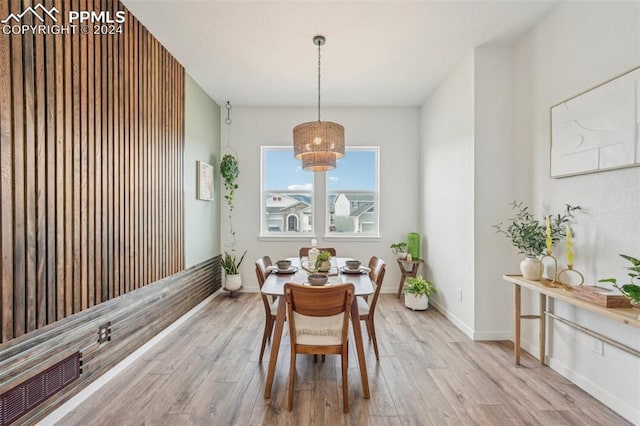 dining room with light hardwood / wood-style flooring